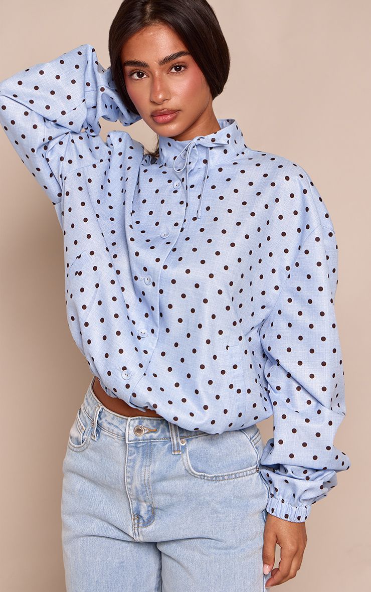 PrettyLittleThing Petite Blue Polka Dot High Neck Tie Detail Long Sleeve Shirt